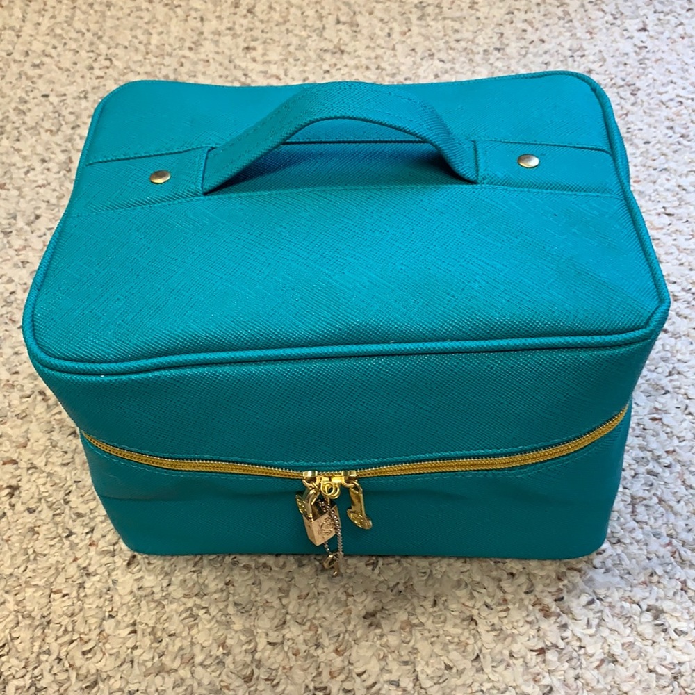 BNWOT cosmetic bag. Zipper & padlock stamped JM.